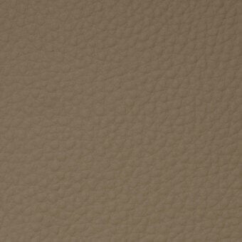 Cougar leather texture, warm tan with pebbled surface, displays a dense pattern of small bumps and a matte finish.